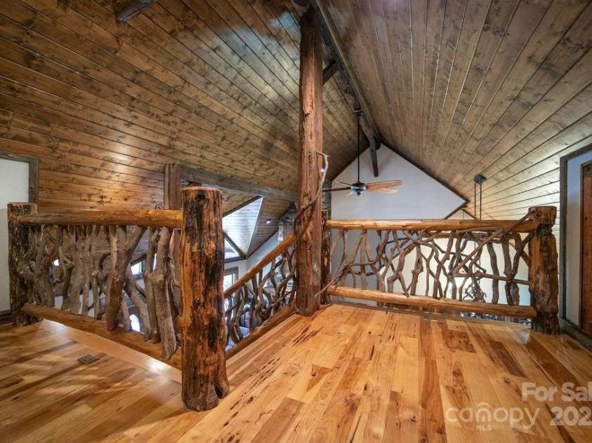 68 Sherwood Village Court, Brevard, NC 28712.  MLS# CAR4232497, YatesRealty ID 1034. Rails made from laurel off of the lot. 