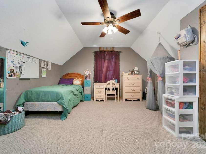 68 Sherwood Village Court, Brevard, NC 28712.  MLS# CAR4232497, YatesRealty ID 1034. Upstairs Bedrroom