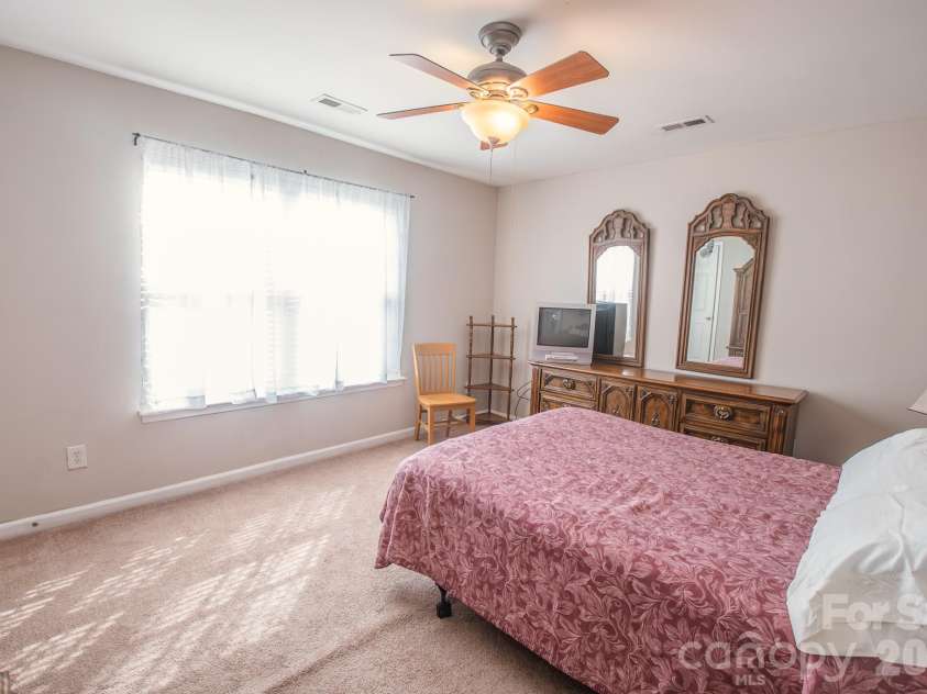 3615 Darlington Road, Matthews, NC 28105.  MLS# CAR4357542, YatesRealty ID 10342. Bedroom 2 Second Level,