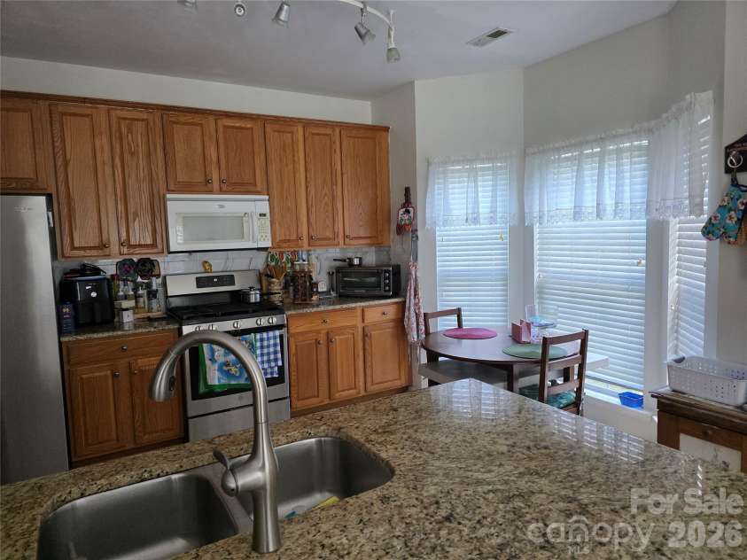 3615 Darlington Road, Matthews, NC 28105.  MLS# CAR4357542, YatesRealty ID 10342. Kitchen