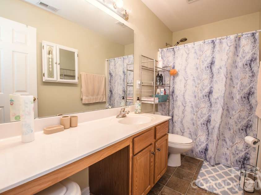 3615 Darlington Road, Matthews, NC 28105.  MLS# CAR4357542, YatesRealty ID 10342. Second Floor Bathroom,