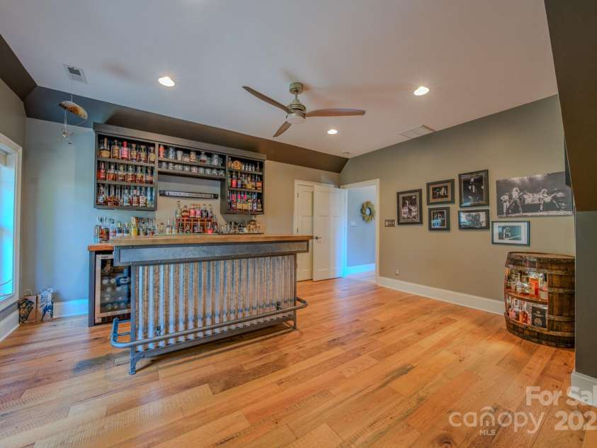 1703 Southpointe Drive, Morganton, NC 28655.  MLS# CAR4231336, YatesRealty ID 10343. Custom bar/lounge in 2022