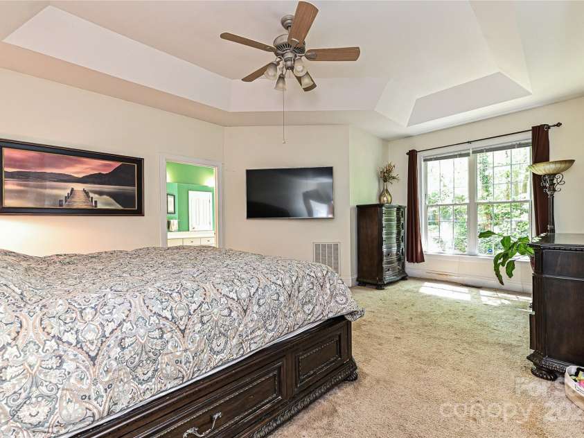 9600 Lockhorn Court, Mint Hill, NC 28227.  MLS# CAR4275817, YatesRealty ID 10345. Primary Bedroom has a trey ceiling.