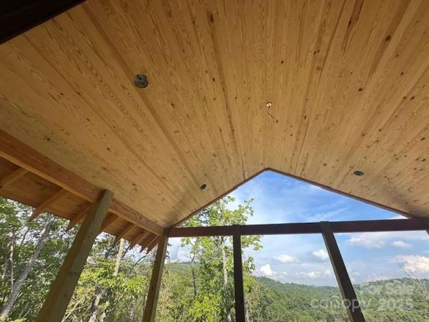 371 Falls View Drive, Pisgah Forest, NC 28768.  MLS# CAR4242719, YatesRealty ID 10349. Impressive beam work