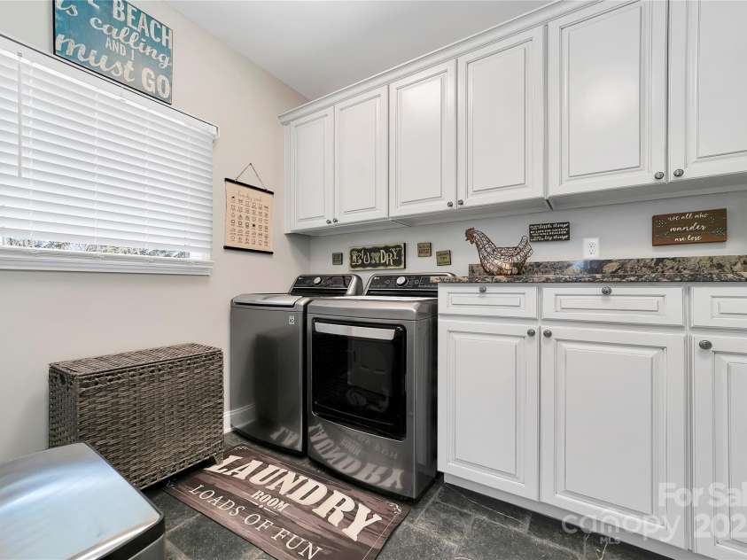 170 Oakanoah Court, Brevard, NC 28712.  MLS# CAR4247487, YatesRealty ID 10350. Laundry Area with Storage and a Sink