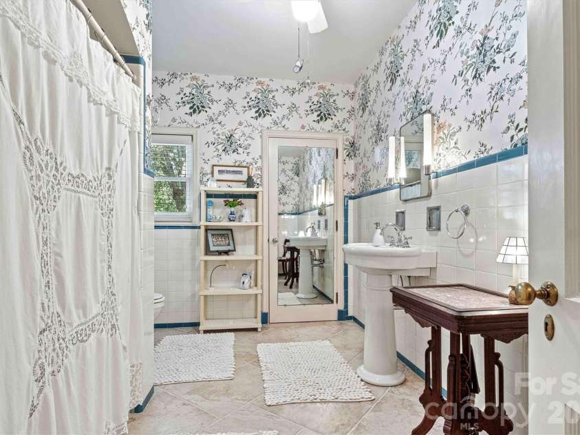 842 North Center Street, Hickory, NC 28601.  MLS# CAR4368578, YatesRealty ID 10351. Left Front Primary Suite/Vanity View
