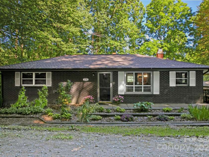 176 Lake Sega Road, Brevard, NC 28712.  MLS# CAR4288679, YatesRealty ID 10354. 