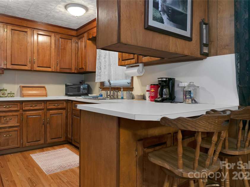 176 Lake Sega Road, Brevard, NC 28712.  MLS# CAR4288679, YatesRealty ID 10354. 