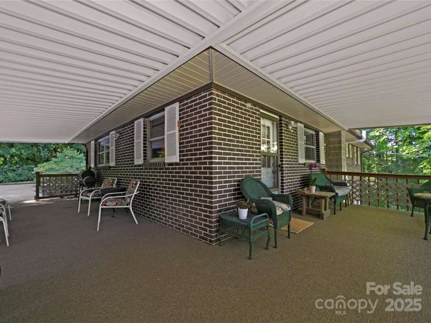 176 Lake Sega Road, Brevard, NC 28712.  MLS# CAR4288679, YatesRealty ID 10354. 