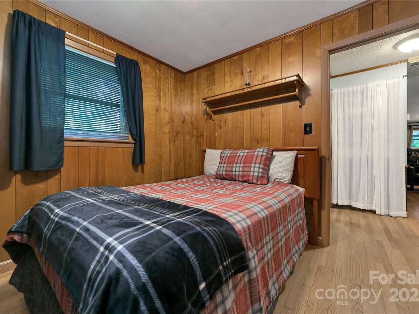 176 Lake Sega Road, Brevard, NC 28712.  MLS# CAR4288679, YatesRealty ID 10354. 