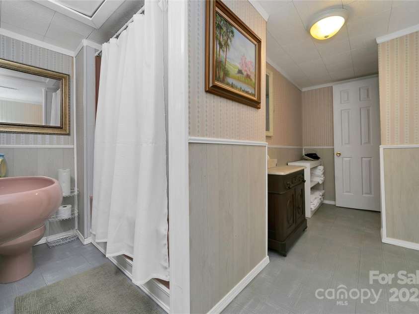 176 Lake Sega Road, Brevard, NC 28712.  MLS# CAR4288679, YatesRealty ID 10354. 