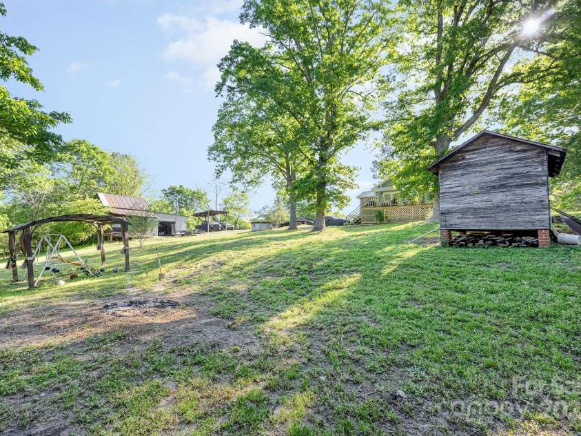 5080 Lambeth Mill Road, Bennett, NC 27208.  MLS# CAR4252192, YatesRealty ID 10358. 