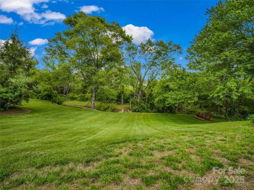 65 Brookside Drive, Hendersonville, NC 28792.  MLS# CAR4259209, YatesRealty ID 10359. 