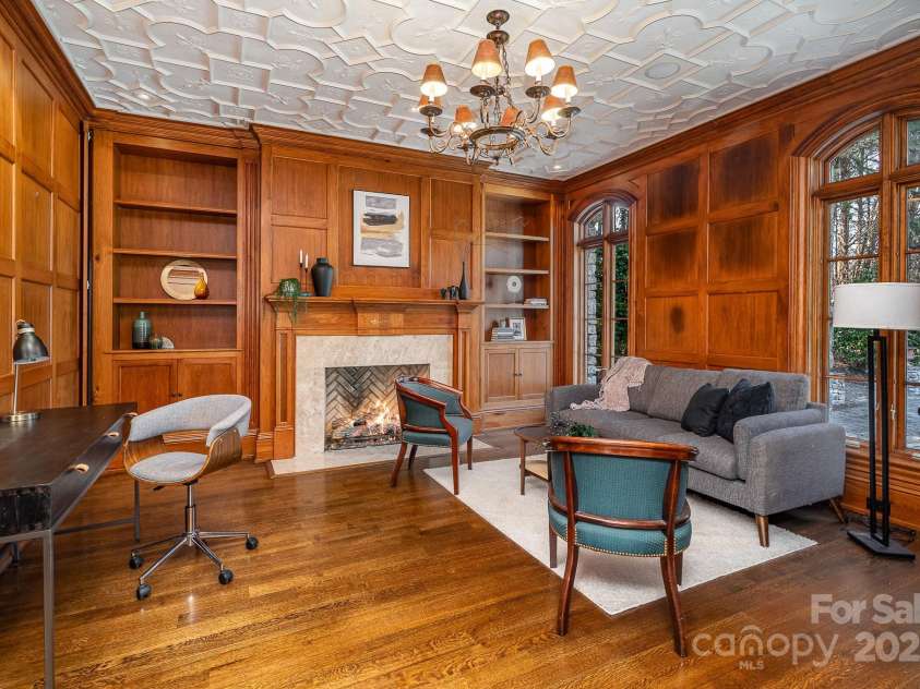 20711 Bethel Church Road, Cornelius, NC 28031.  MLS# CAR4225782, YatesRealty ID 1036. Paneled Study, built-in bookshelves, gas fireplace