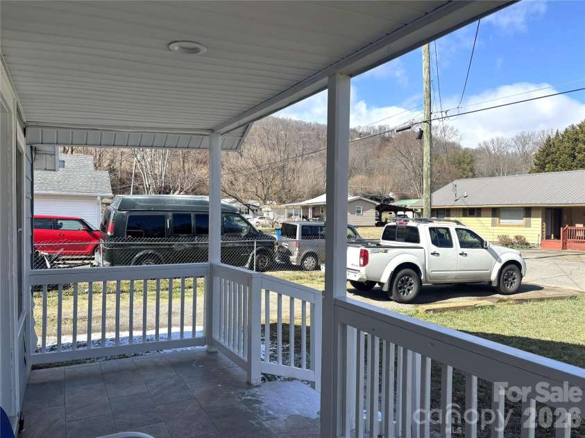 29 Fifth Street, Waynesville, NC 28786.  MLS# CAR4346674, YatesRealty ID 10360. View from the covered front deck.