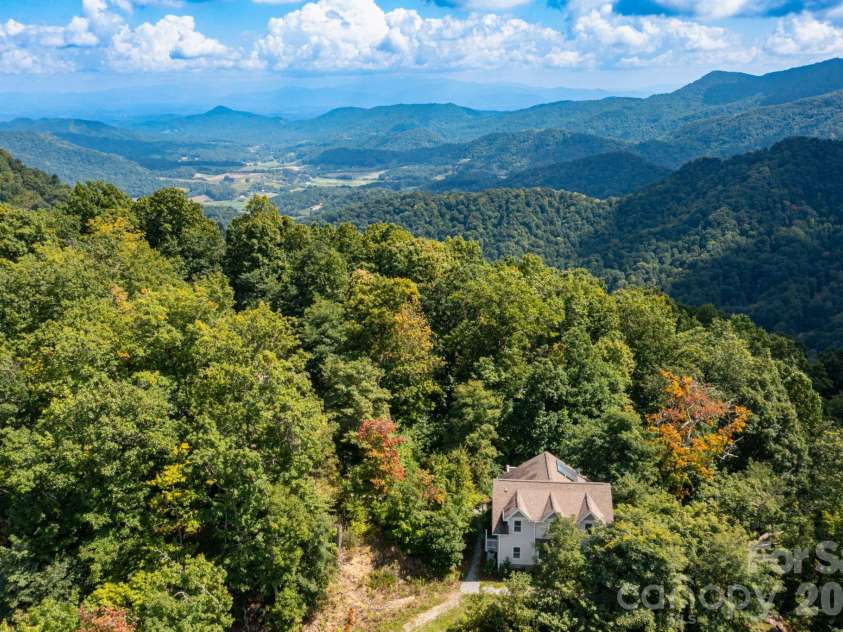 11 Lila Lane, Clyde, NC 28721.  MLS# CAR4424951, YatesRealty ID 10372. Aerial Image