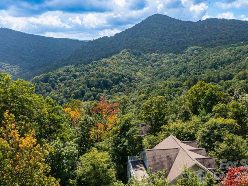 11 Lila Lane, Clyde, NC 28721.  MLS# CAR4424951, YatesRealty ID 10372. Aerial Image