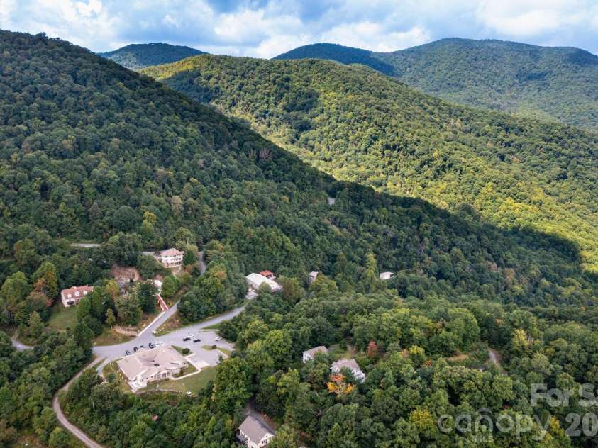 11 Lila Lane, Clyde, NC 28721.  MLS# CAR4424951, YatesRealty ID 10372. Aerial Image - of Community