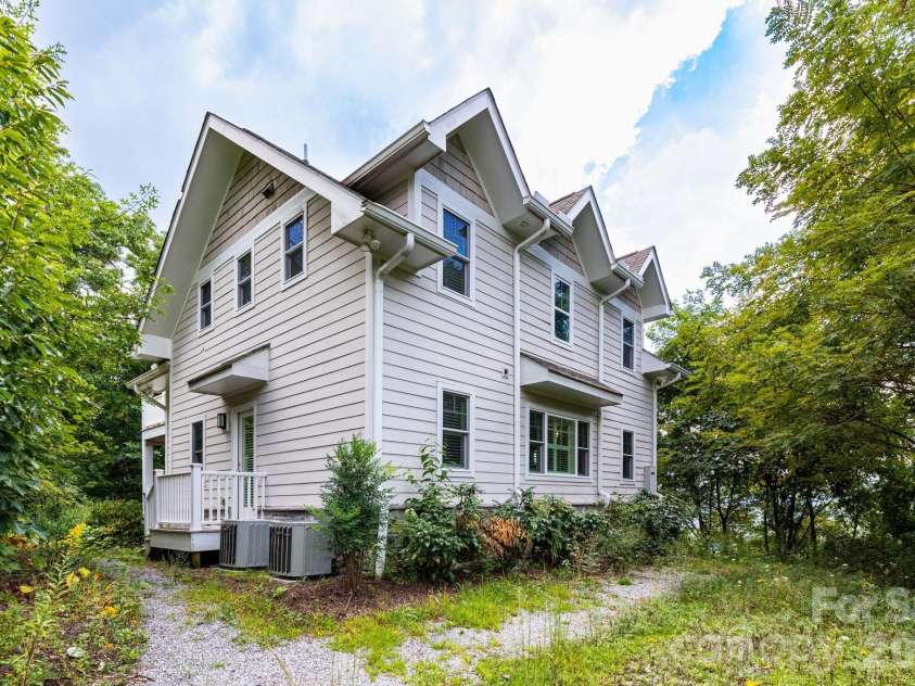 11 Lila Lane, Clyde, NC 28721.  MLS# CAR4424951, YatesRealty ID 10372. Back of Home
