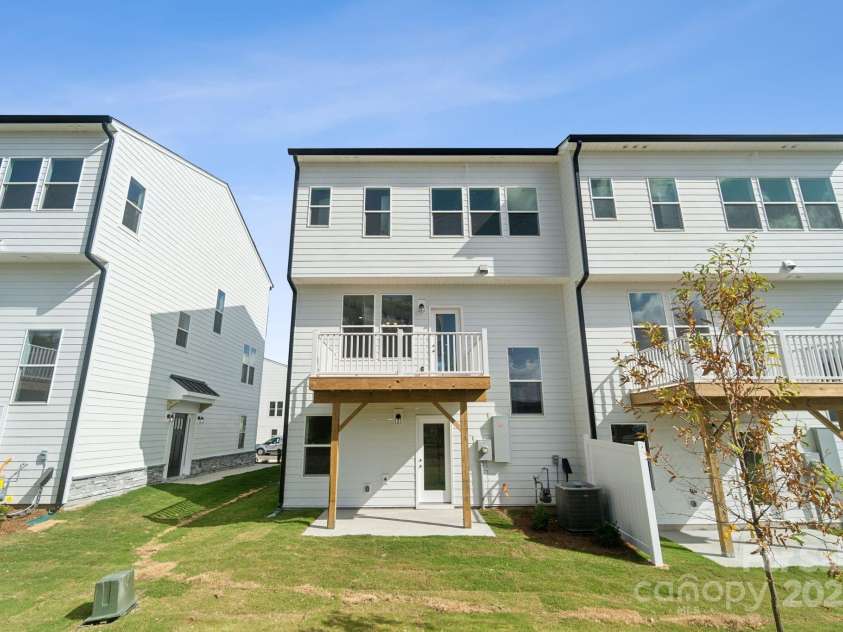 9239 Delancey Lane, Concord, NC 28027.  MLS# CAR4234338, YatesRealty ID 10372. Deck and patio for outdoor living - Has Common Area in the back yard, too.