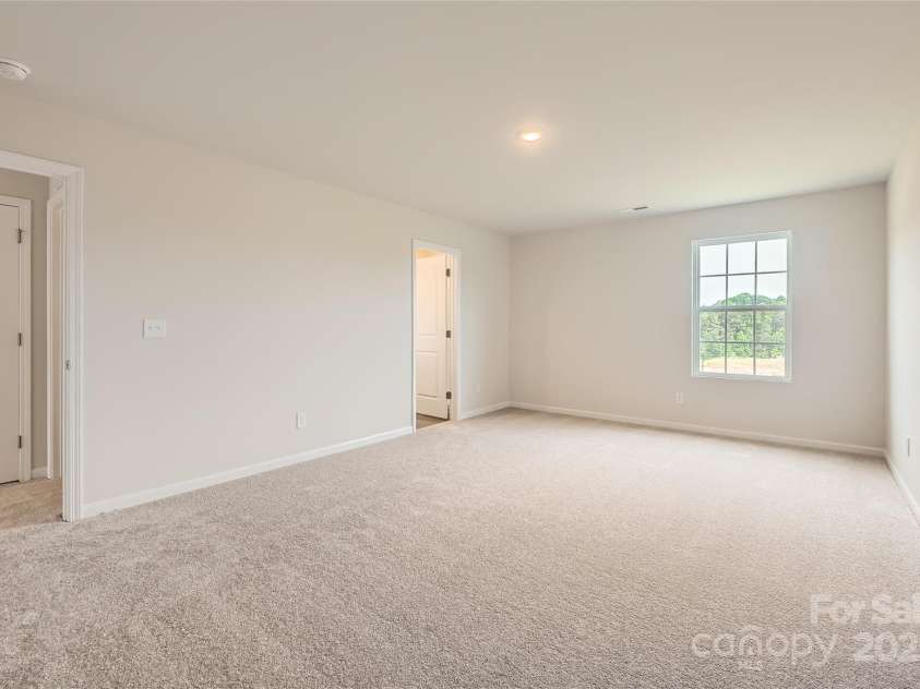 151 Astor Street, Troutman, NC 28166.  MLS# CAR4252678, YatesRealty ID 10375. Primary Bedroom