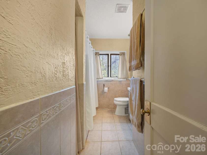 7 Rippy Hill Lane, Tryon, NC 28782.  MLS# CAR4366540, YatesRealty ID 10382. 
