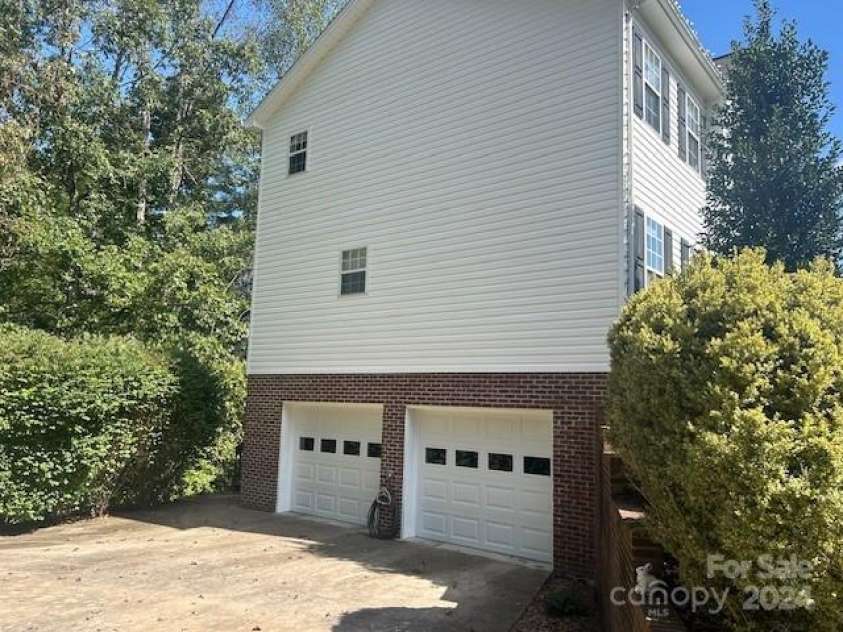 308 Carrituck Court, Lenoir, NC 28645.  MLS# CAR4189663, YatesRealty ID 10383. Double car garage