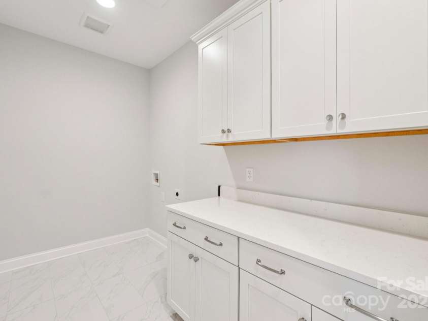 15009 Brownleigh Lane, Huntersville, NC 28078.  MLS# CAR4195439, YatesRealty ID 1039. Laundry