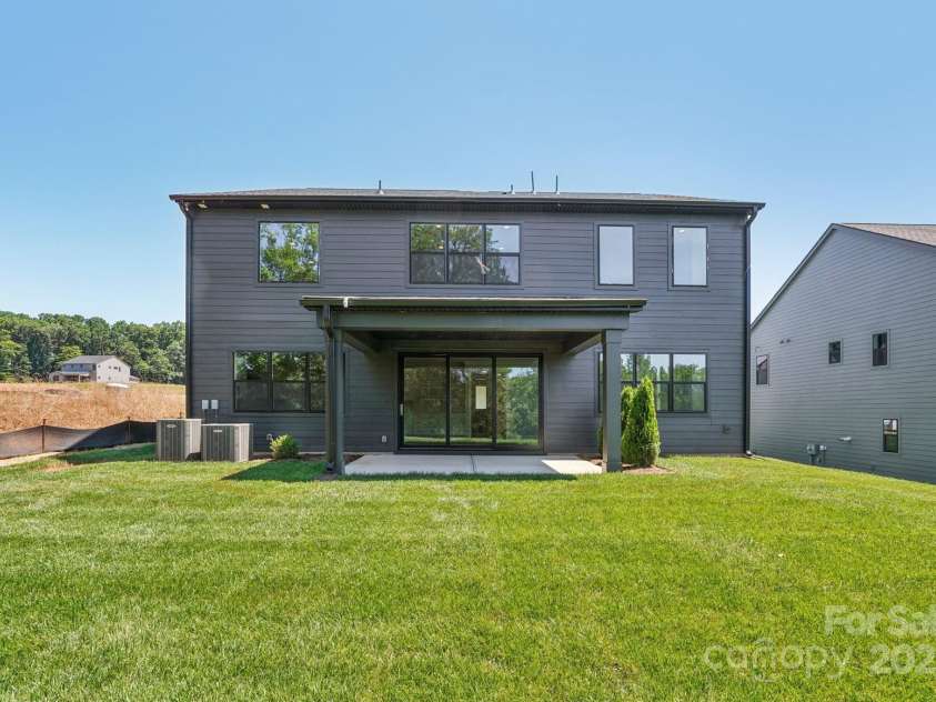 15009 Brownleigh Lane, Huntersville, NC 28078.  MLS# CAR4195439, YatesRealty ID 1039. Rear of home