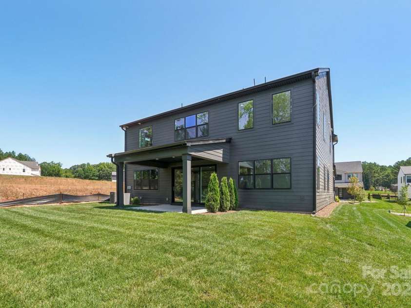 15009 Brownleigh Lane, Huntersville, NC 28078.  MLS# CAR4195439, YatesRealty ID 1039. Rear of home