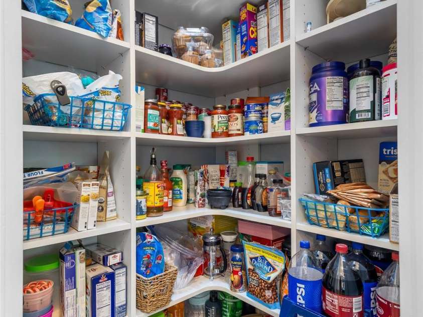 5212 Meadowcroft Way, Fort Mill, SC 29708.  MLS# CAR4354532, YatesRealty ID 10397. Solid wood shelves in WI pantry