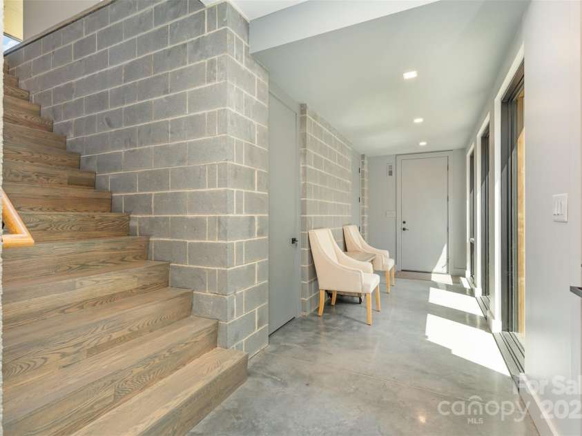 386 Squirrel Lane, Lake Wylie, SC 29710.  MLS# CAR4263022, YatesRealty ID 1040. Stairway to basement level