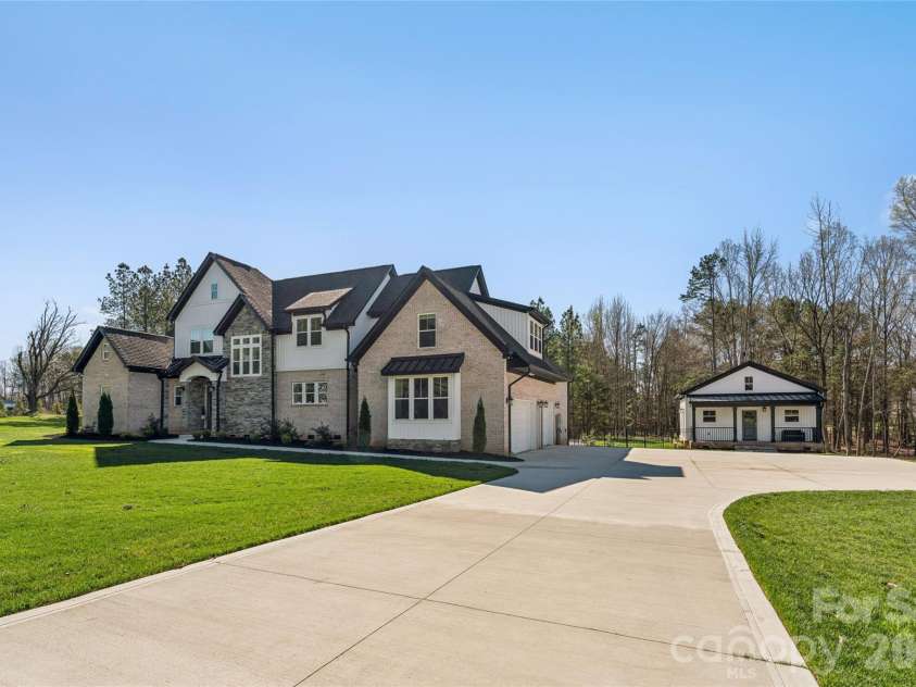 6615 Farmstead Lane, Concord, NC 28027.  MLS# CAR4357830, YatesRealty ID 10405. Front Elevation w/ADU