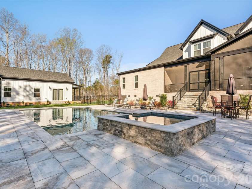 6615 Farmstead Lane, Concord, NC 28027.  MLS# CAR4357830, YatesRealty ID 10405. Hot Tub from Firepit