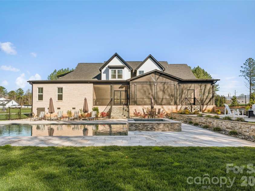 6615 Farmstead Lane, Concord, NC 28027.  MLS# CAR4357830, YatesRealty ID 10405. Resort Style Back Yard