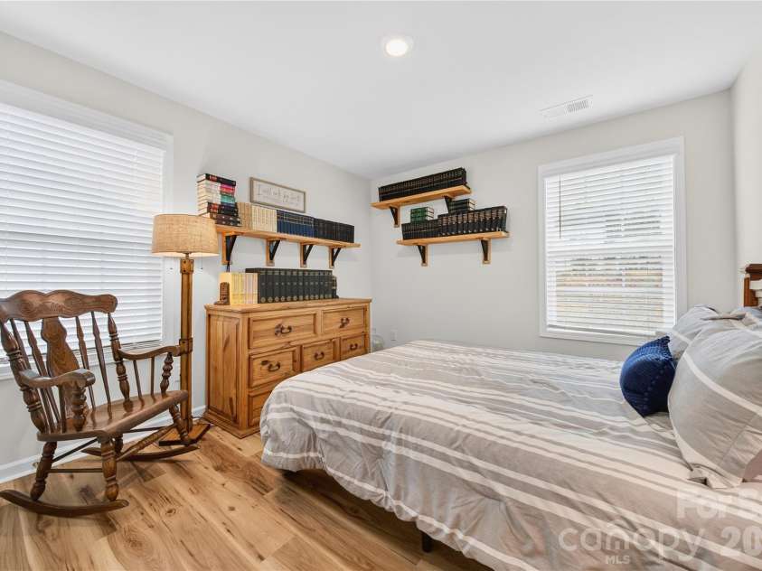 113 Saidin Lane, Troutman, NC 28166.  MLS# CAR4363898, YatesRealty ID 10408. Bedroom 4 is on the back of the home overlooking the fenced backyard. 