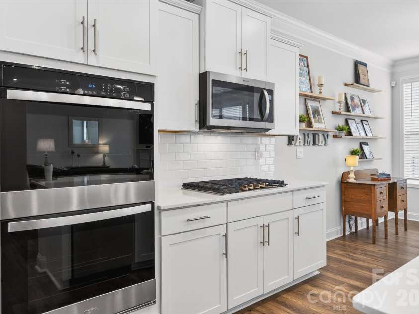 113 Saidin Lane, Troutman, NC 28166.  MLS# CAR4363898, YatesRealty ID 10408. Double ovens and gas cooktop. Prepare the feast!