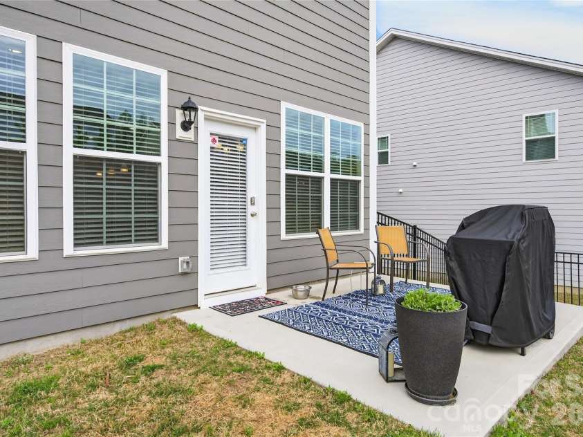 113 Saidin Lane, Troutman, NC 28166.  MLS# CAR4363898, YatesRealty ID 10408. Relax on your back patio. 