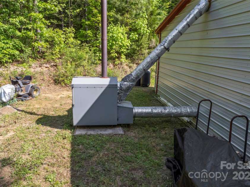 743 Dream Lane, Salisbury, NC 28146.  MLS# CAR4253573, YatesRealty ID 10410. Garage / Workshop wood burning furnace