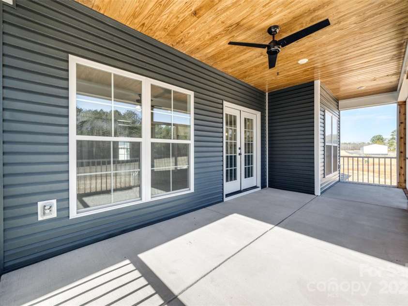 636 Edwards Road, Fort Lawn, SC 29714.  MLS# CAR4200564, YatesRealty ID 10411. The screened back porch is beautiful and great for all seasons.