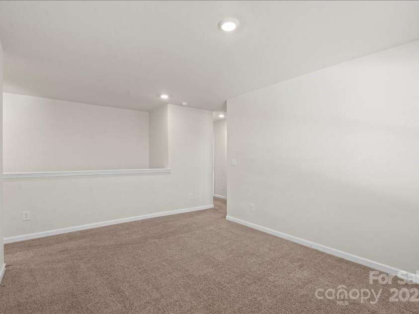 221 Wildflower Drive, Locust, NC 28097.  MLS# CAR4274547, YatesRealty ID 10414. 