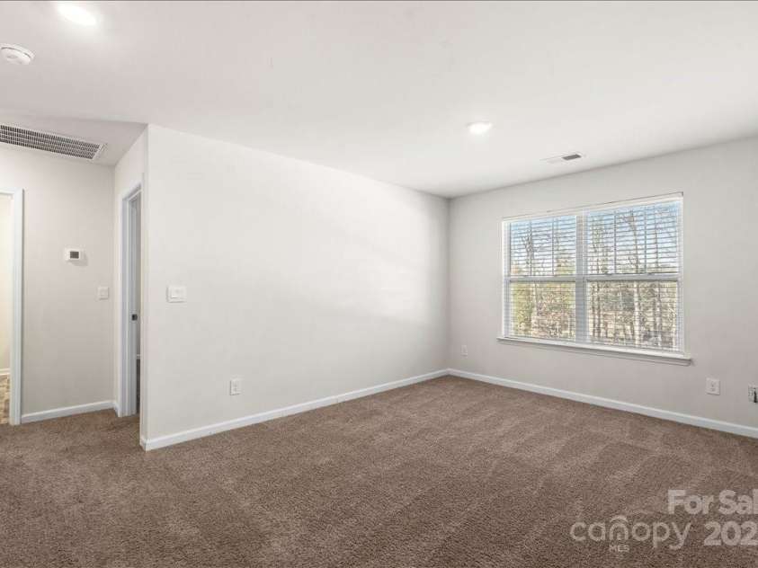 221 Wildflower Drive, Locust, NC 28097.  MLS# CAR4274547, YatesRealty ID 10414. 