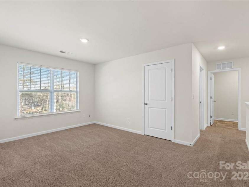 221 Wildflower Drive, Locust, NC 28097.  MLS# CAR4274547, YatesRealty ID 10414. 