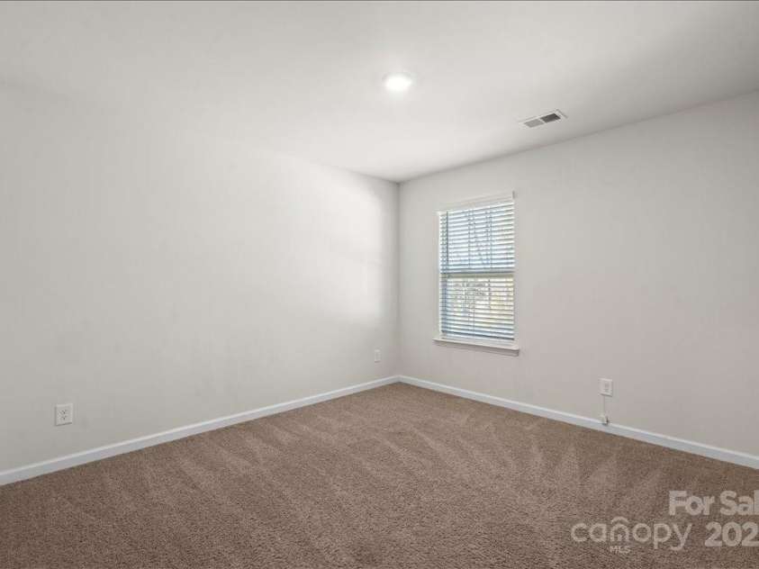 221 Wildflower Drive, Locust, NC 28097.  MLS# CAR4274547, YatesRealty ID 10414. 