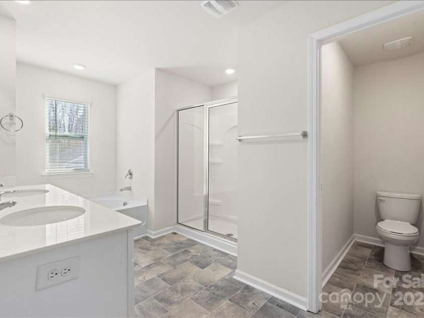 221 Wildflower Drive, Locust, NC 28097.  MLS# CAR4274547, YatesRealty ID 10414. 