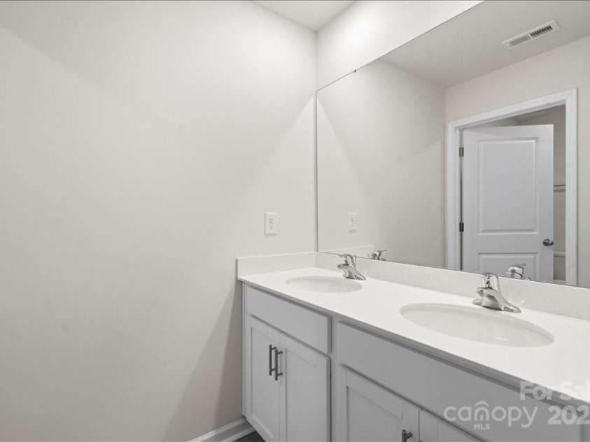 221 Wildflower Drive, Locust, NC 28097.  MLS# CAR4274547, YatesRealty ID 10414. 