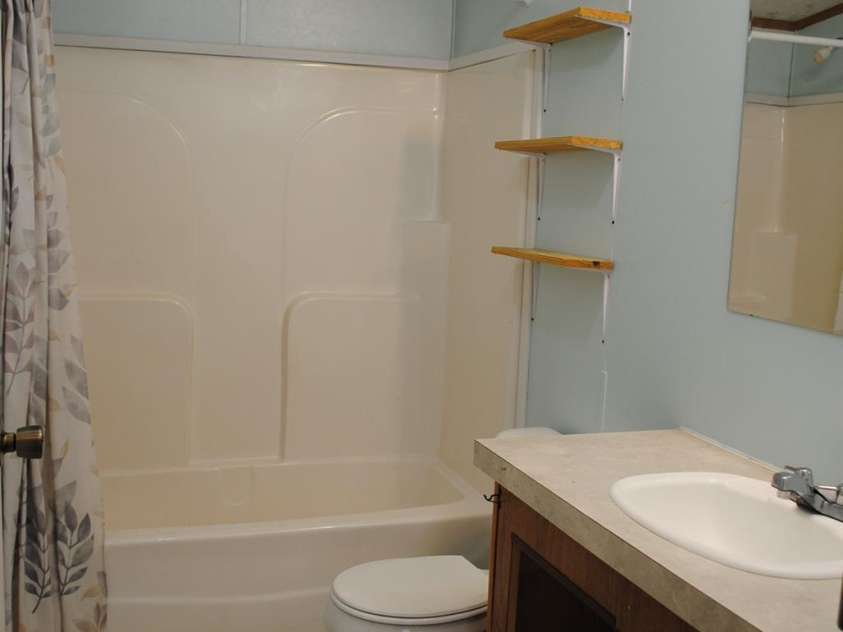 12367 Old Beatty Ford Road, Rockwell, NC 28138.  MLS# CAR4358672, YatesRealty ID 10421. House bath