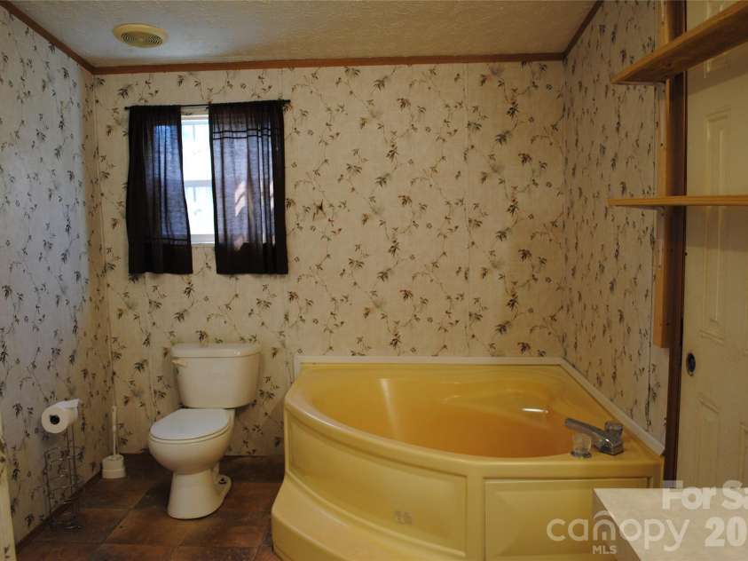12367 Old Beatty Ford Road, Rockwell, NC 28138.  MLS# CAR4358672, YatesRealty ID 10421. Primary bath