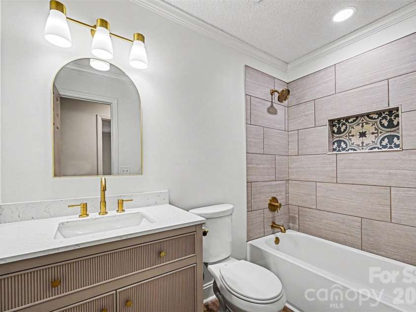 608 Azalea Lane, China Grove, NC 28023.  MLS# CAR4386987, YatesRealty ID 10425. Main floor house bath