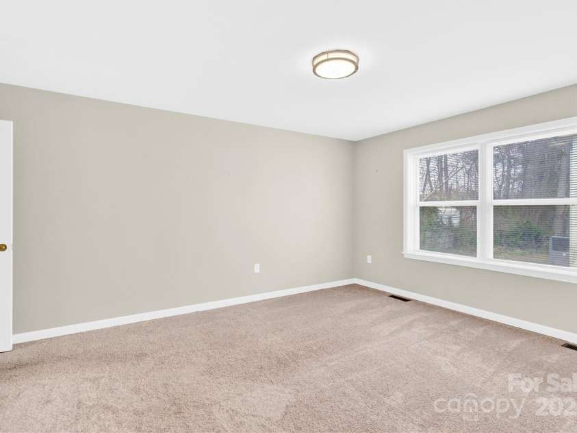 340 Vernon Lane, Statesville, NC 28677.  MLS# CAR4231472, YatesRealty ID 10432. Primary Bedroom